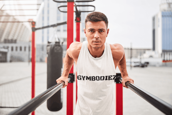 Male Fitness Model that is wearing a gymbodiez outfit and promoting the world's most innovative & portable pullup bar